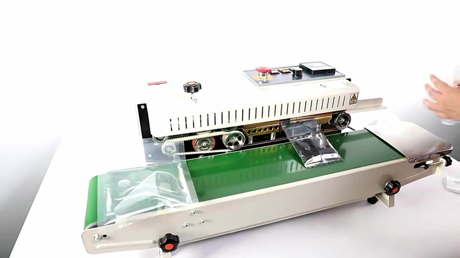 Automatic Horizontal Continuous Plastic Bag Band Vacuum Sealer Machine